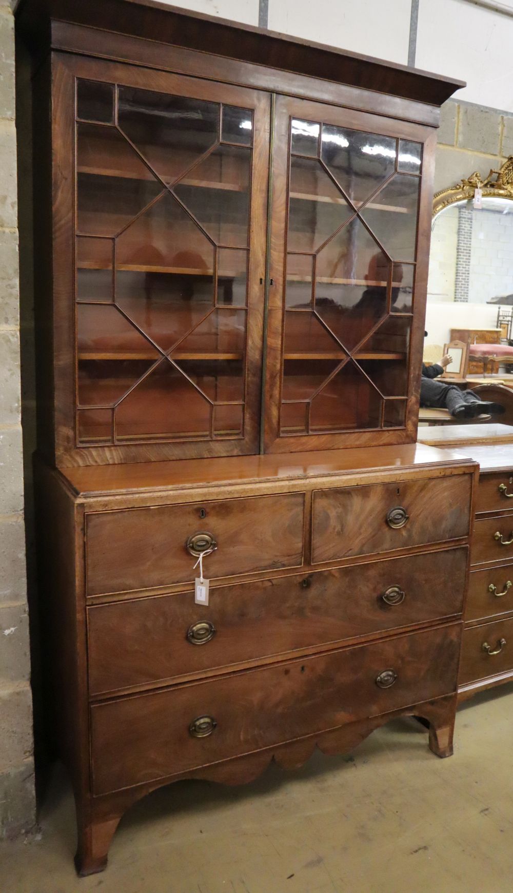 A George III mahogany caddy-top chest with associated bookcase top, W.120cm, D.54cm, H.216cm